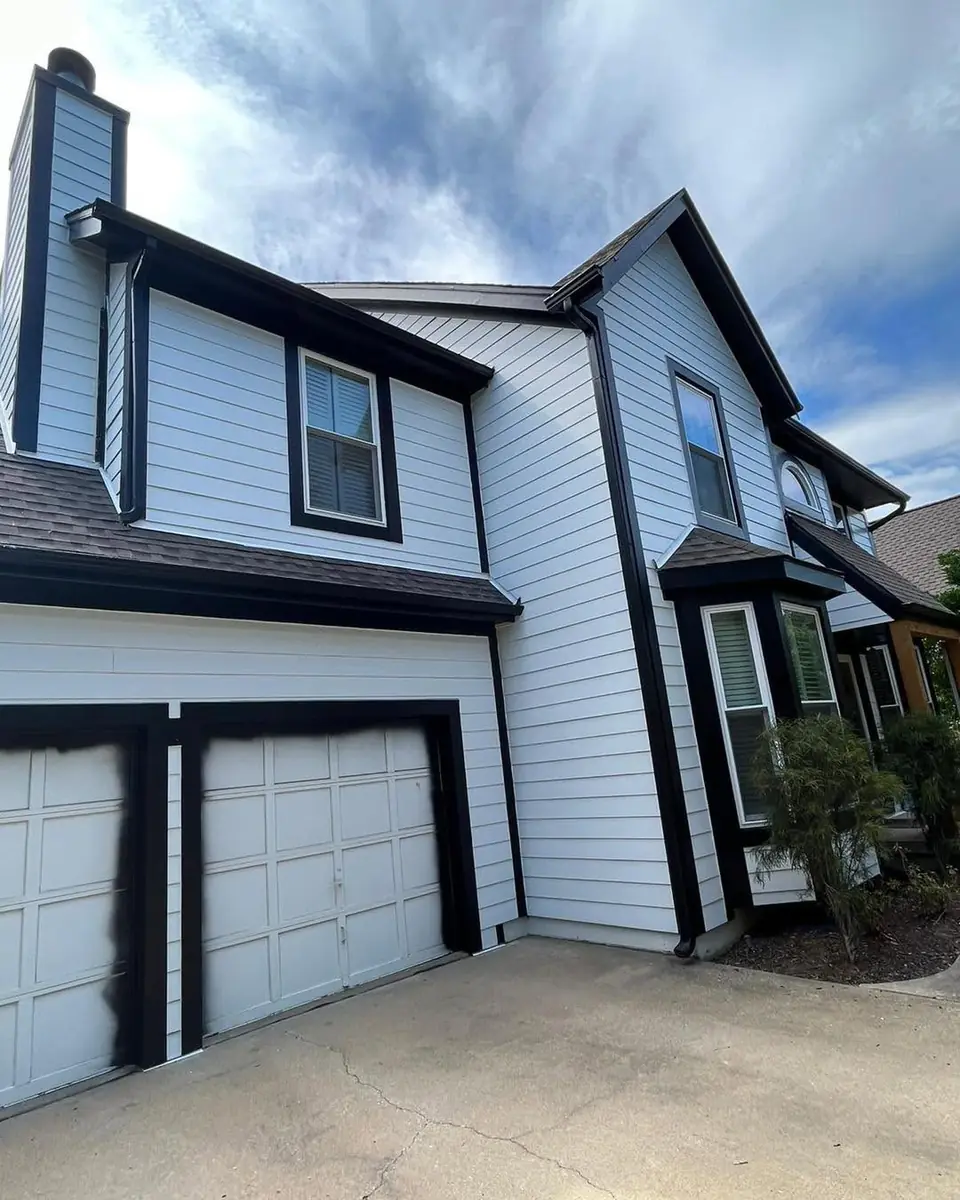 New lap siding with dark trim on a Kansas City home