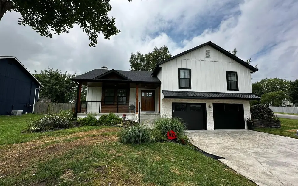 White board-and-batten siding on a remodeled Kansas City home