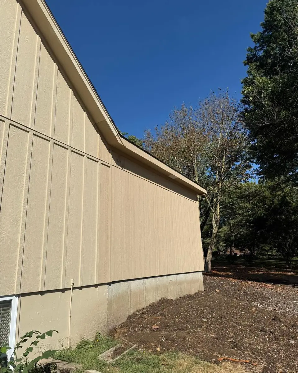 New board-and-batten siding on a Kansas City home